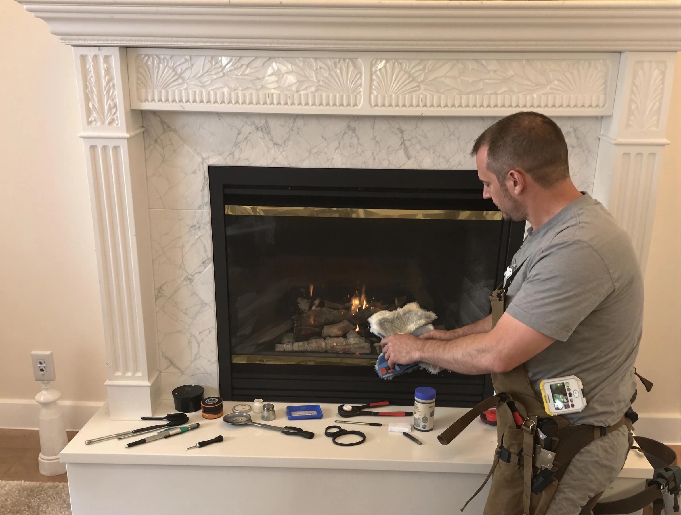 North Brunswick Chimney Sweep performing fireplace maintenance in North Brunswick, NJ